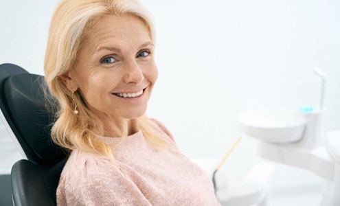 Woman smiling in dental chair