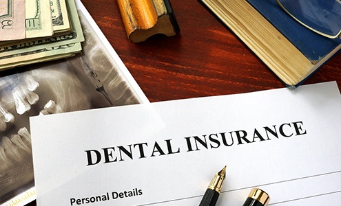 dental insurance form on table