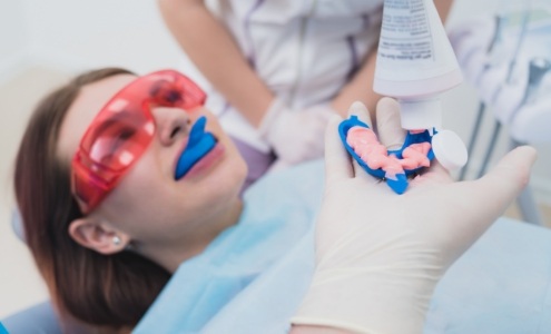 Dental patient receiving fluoride treatment