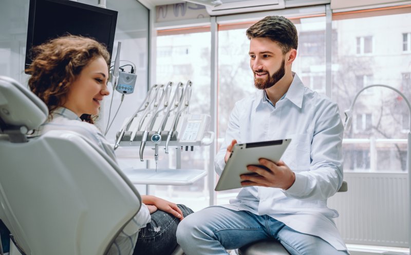 patient speaking with a cosmetic dentist in Fort Mill