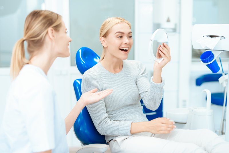 a patient talking with a cosmetic dentist 